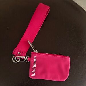 Lululemon dark pink Wristlet with Strap pouch great condition